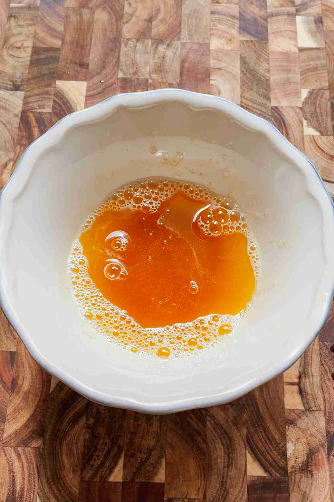 Golden brown butter in a saucepan for sourdough brownies
