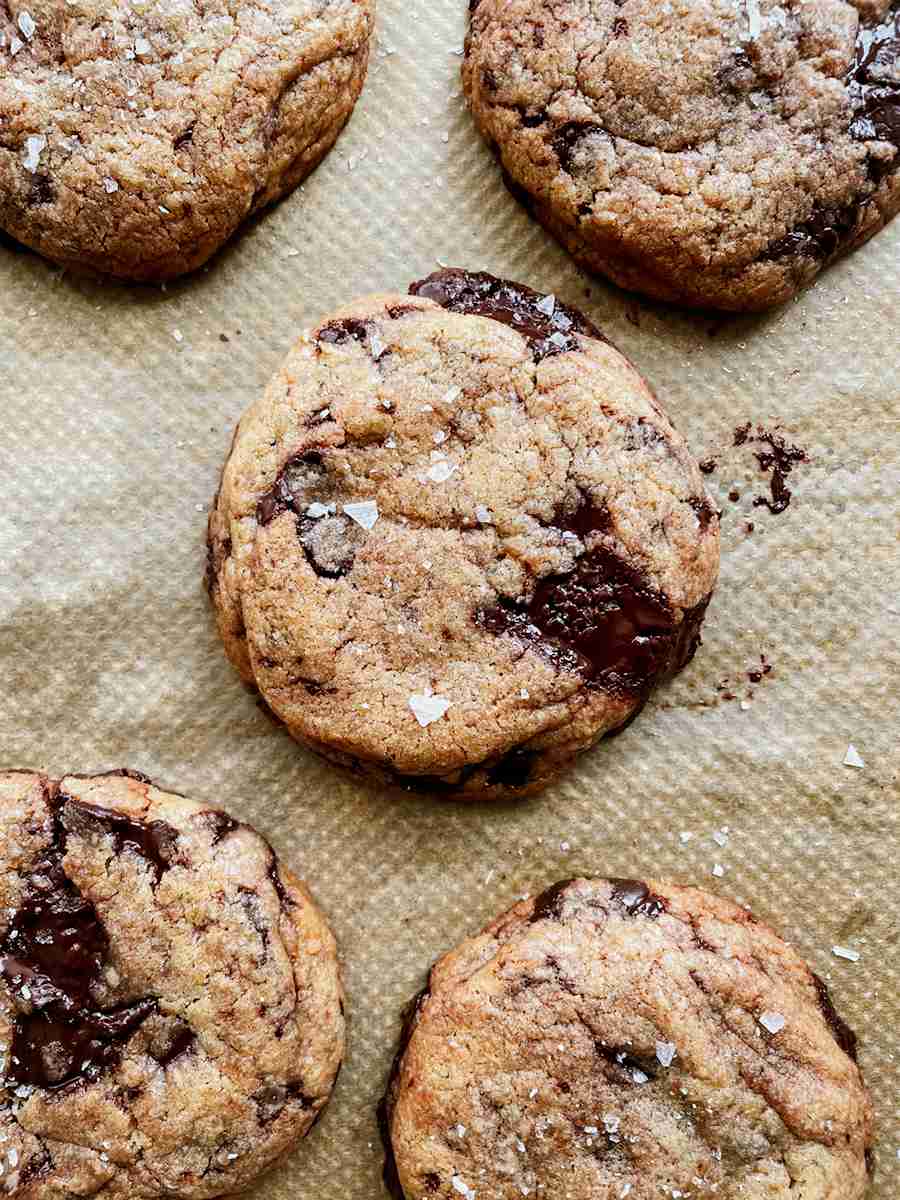Sourdough chocolate chip cookies with melted chocolate chunks.