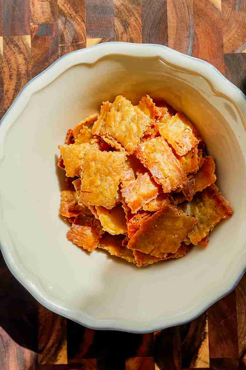 Golden baked sourdough cheese crackers fresh out of the oven.