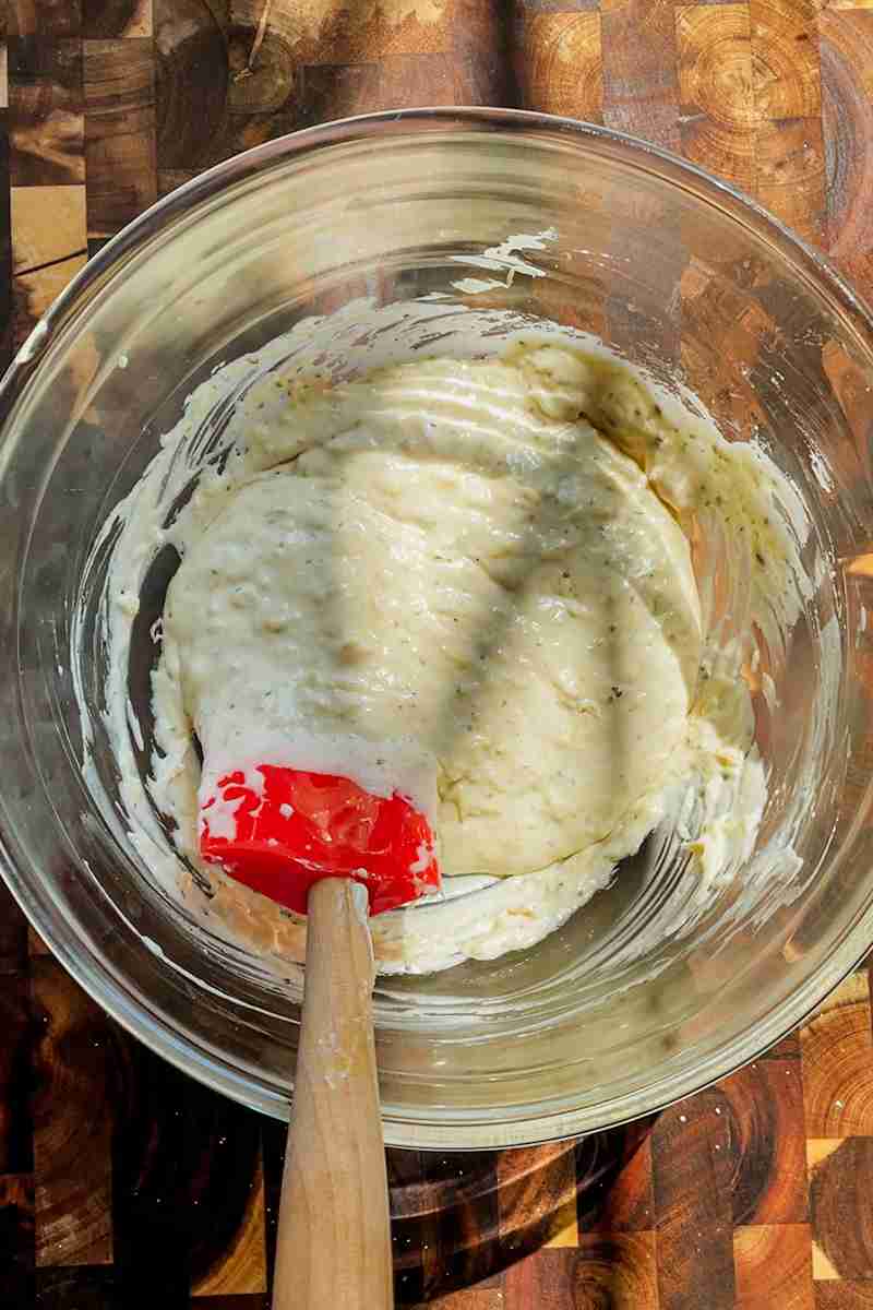 Sourdough cheese cracker batter mixed together in a bowl.