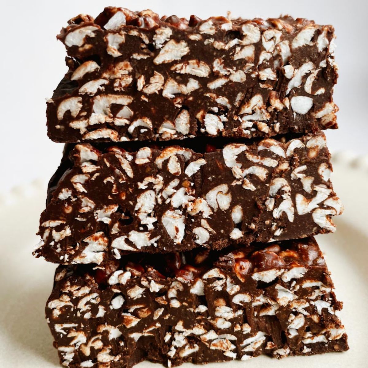 Chocolate crunch bars made with dark chocolate, hazelnut butter, honey, and puffed buckwheat