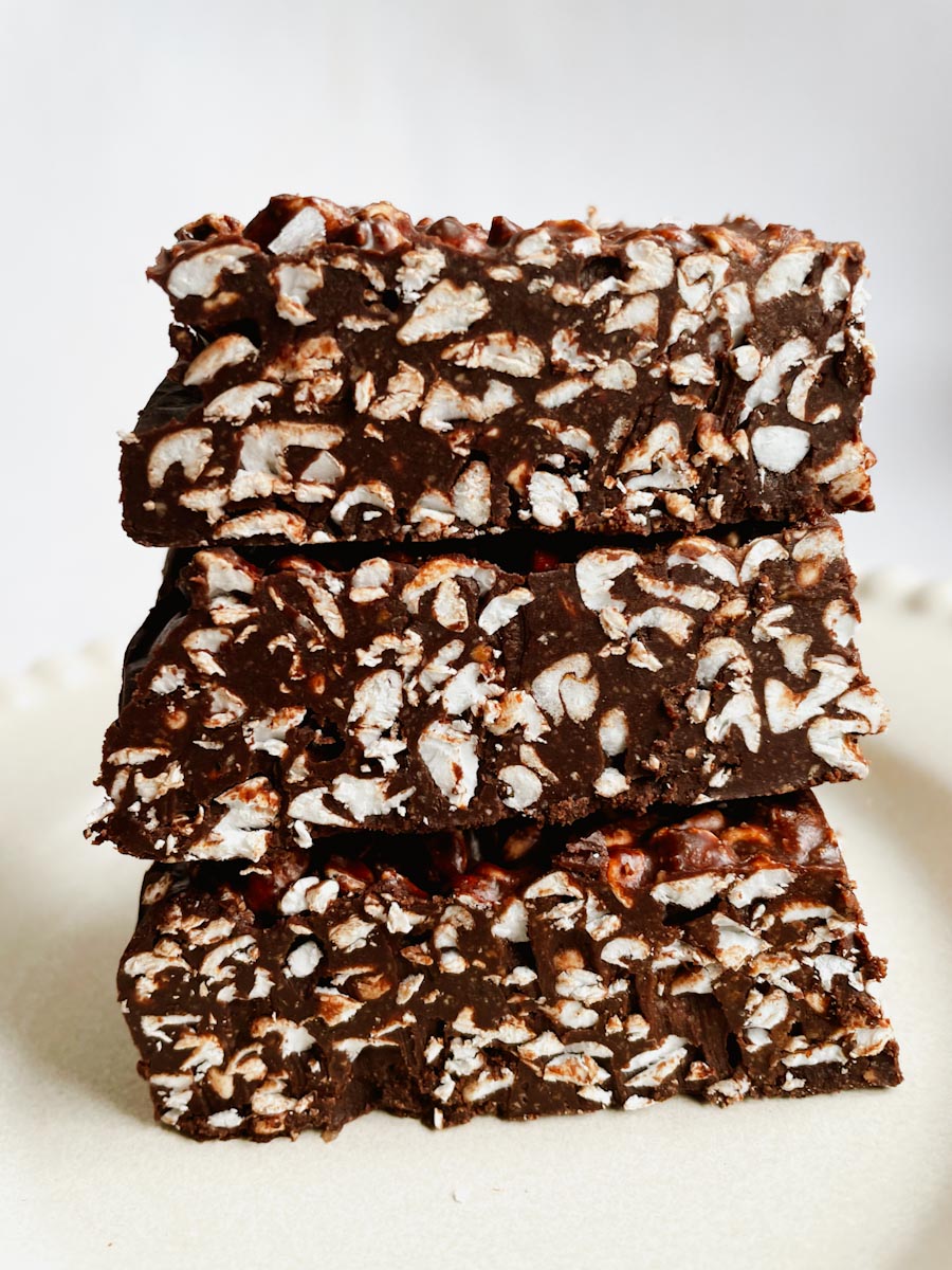 Chocolate crunch bars made with dark chocolate, hazelnut butter, honey, and puffed buckwheat