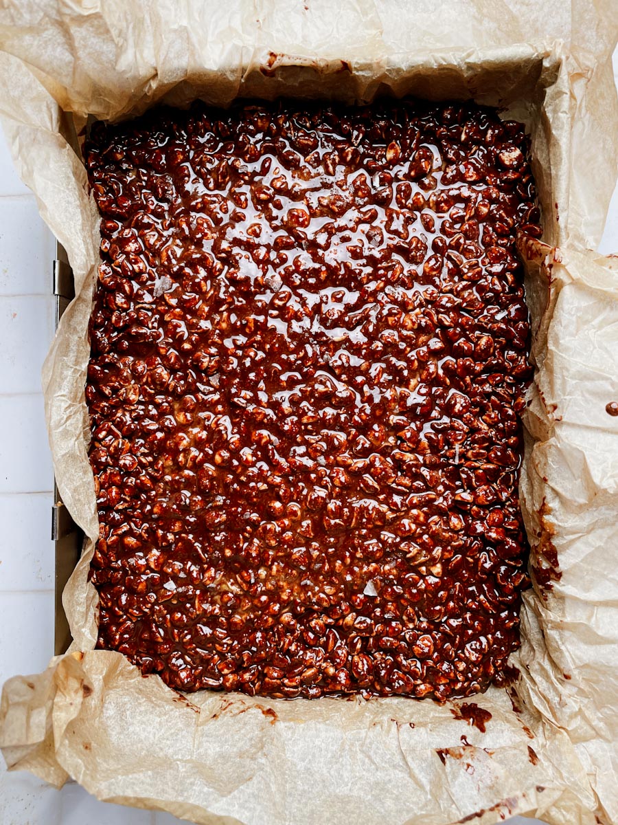 set chocolate crunch bars in a square pan before slicing
