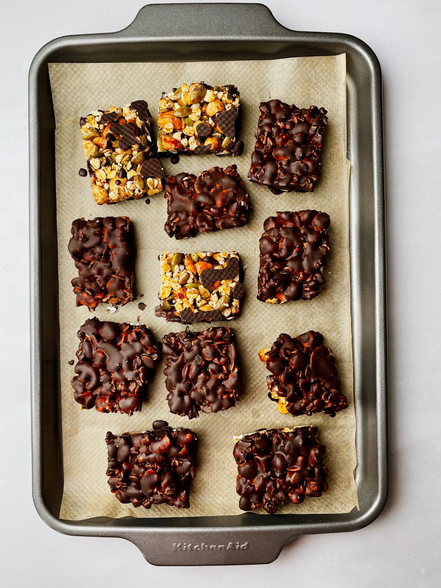 Nut bars dipped in dark chocolate with flaky sea salt