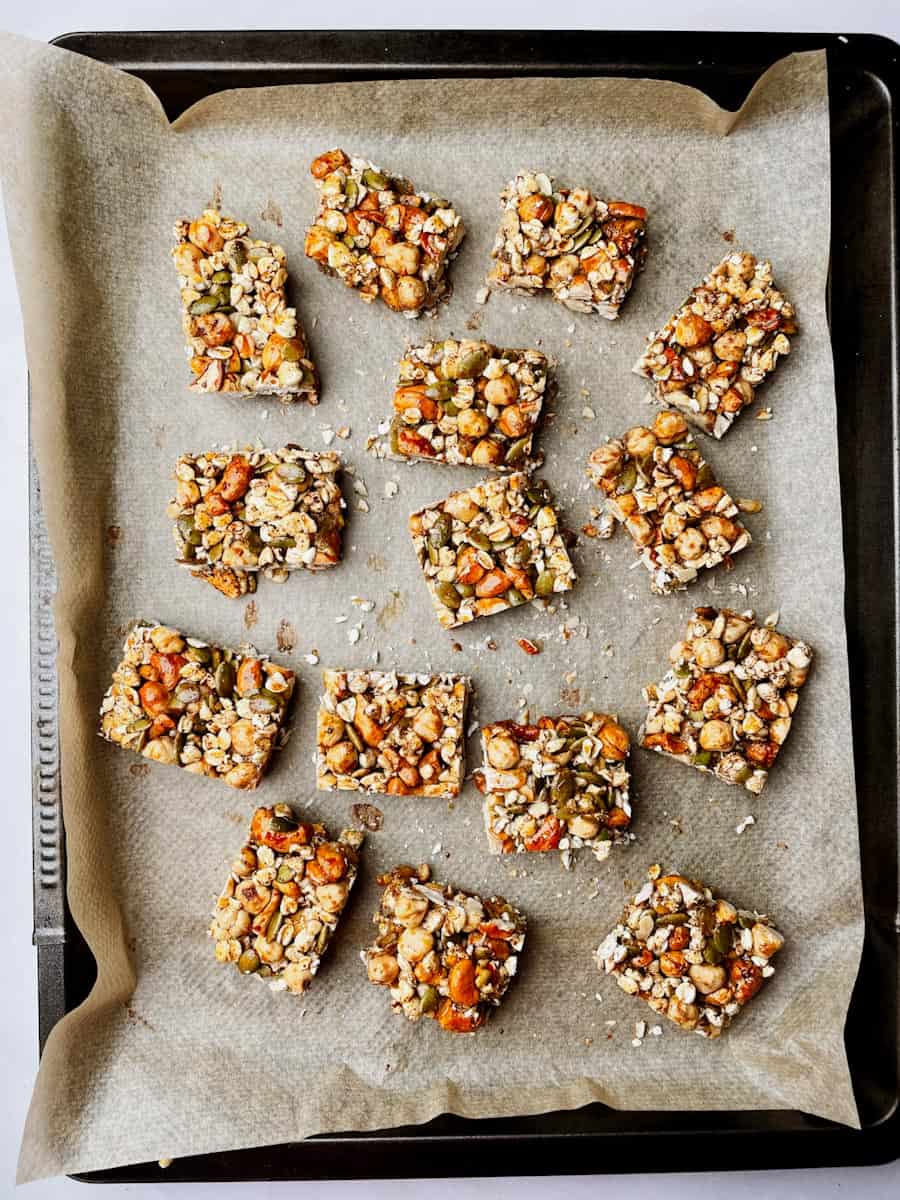 Sliced homemade nut bars ready for dipping in chocolate