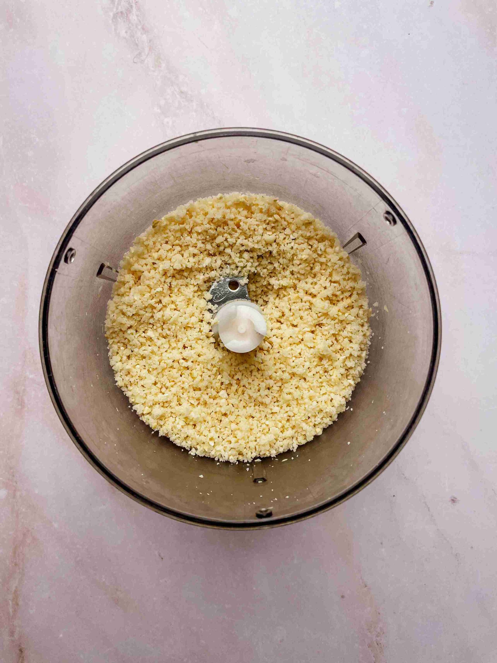 cashews garlic and parmesan in food processor for pesto without pine nuts