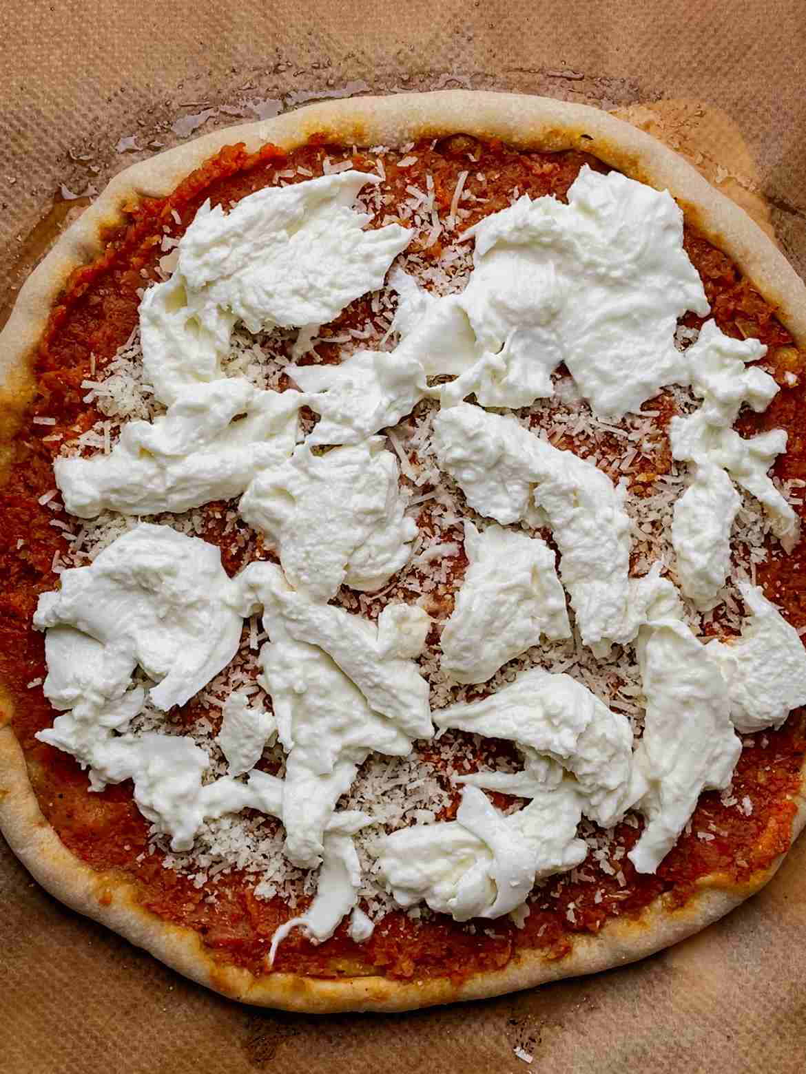 sourdough pizza with mozzarella before final bake