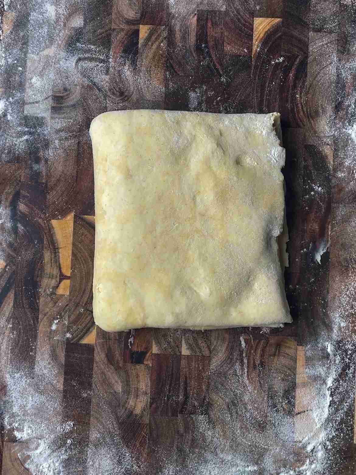Completed book fold for sourdough rough puff pastry showing layers