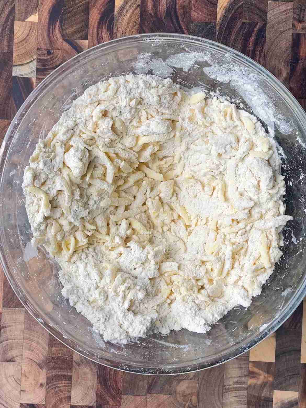Grated butter tossed and coated in flour and salt for sourdough puff pastry dough