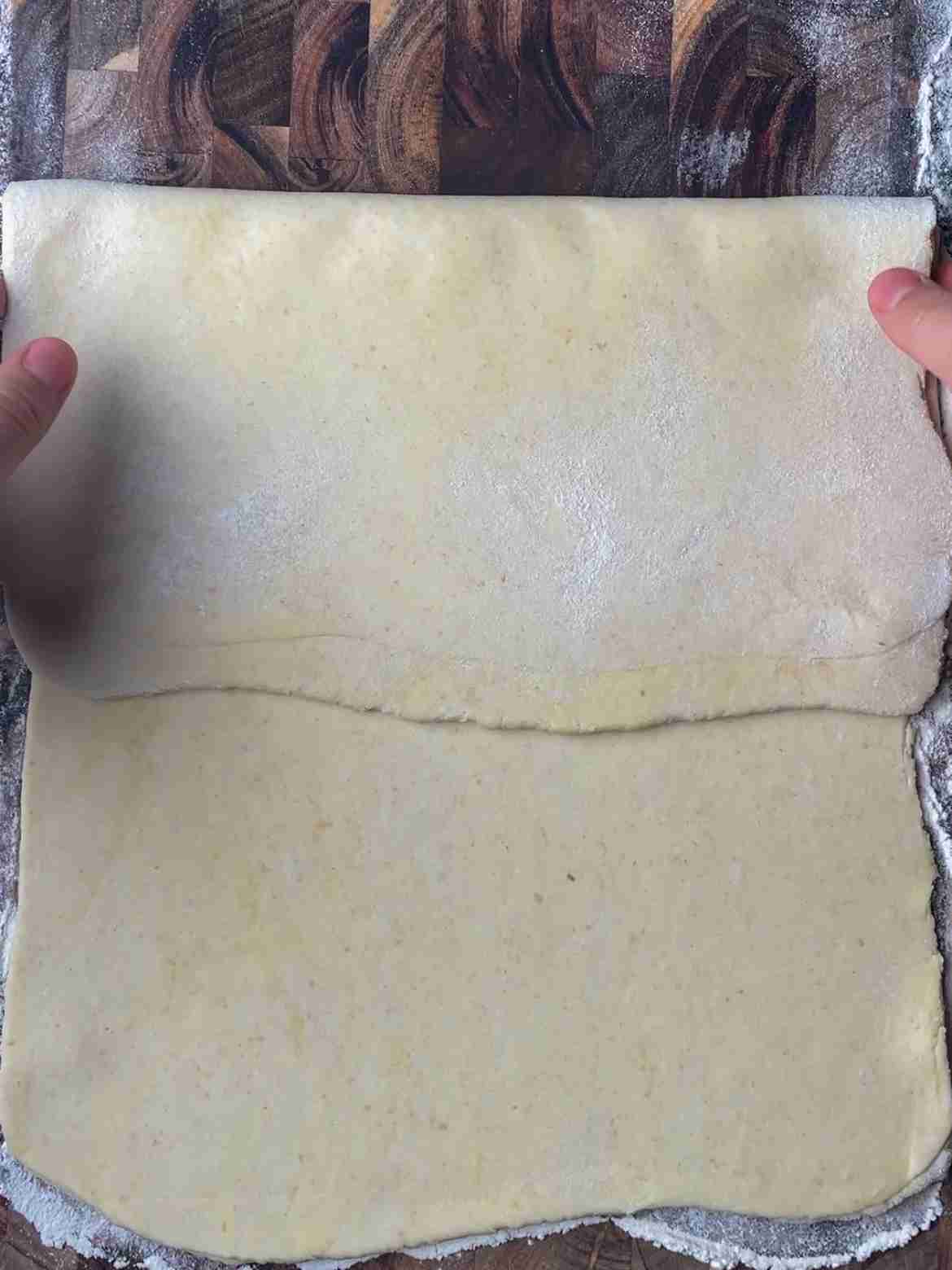 Letter fold for sourdough puff pastry, one edge folded to center