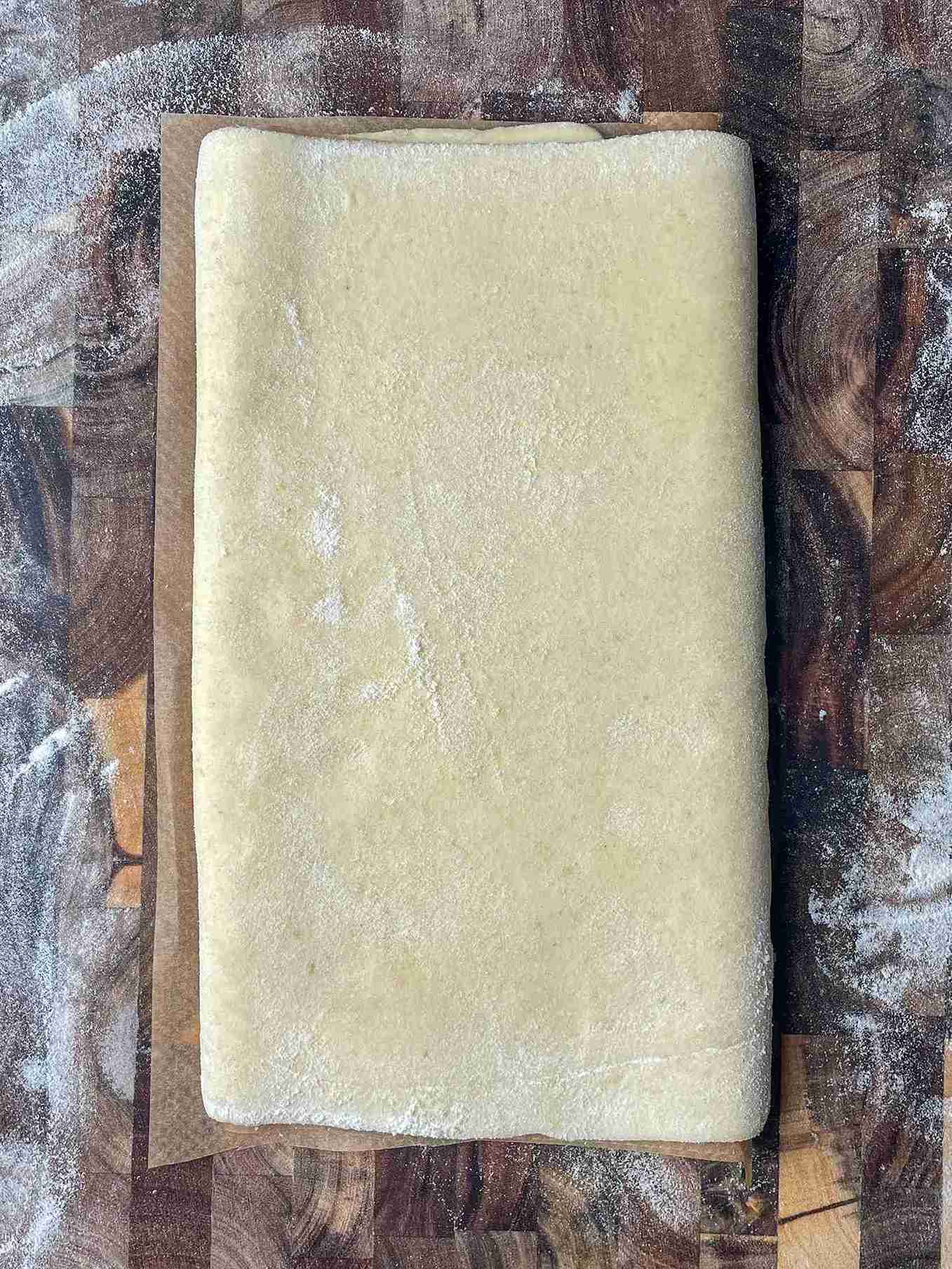 Finished sourdough puff pastry dough wrapped and ready for final rest in the fridge