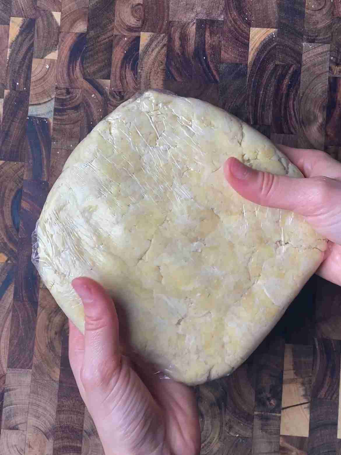 Rough shaggy dough after mixing
sourdough starter into flour and butter mixture