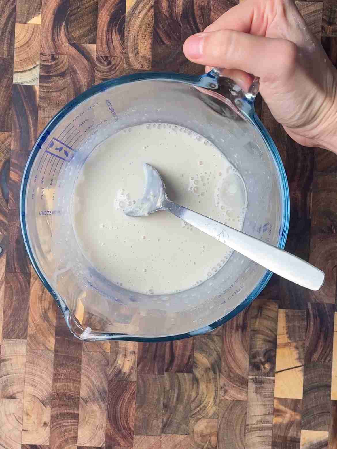Sourdough discard and cold water
combined in a bowl for puff pastry
