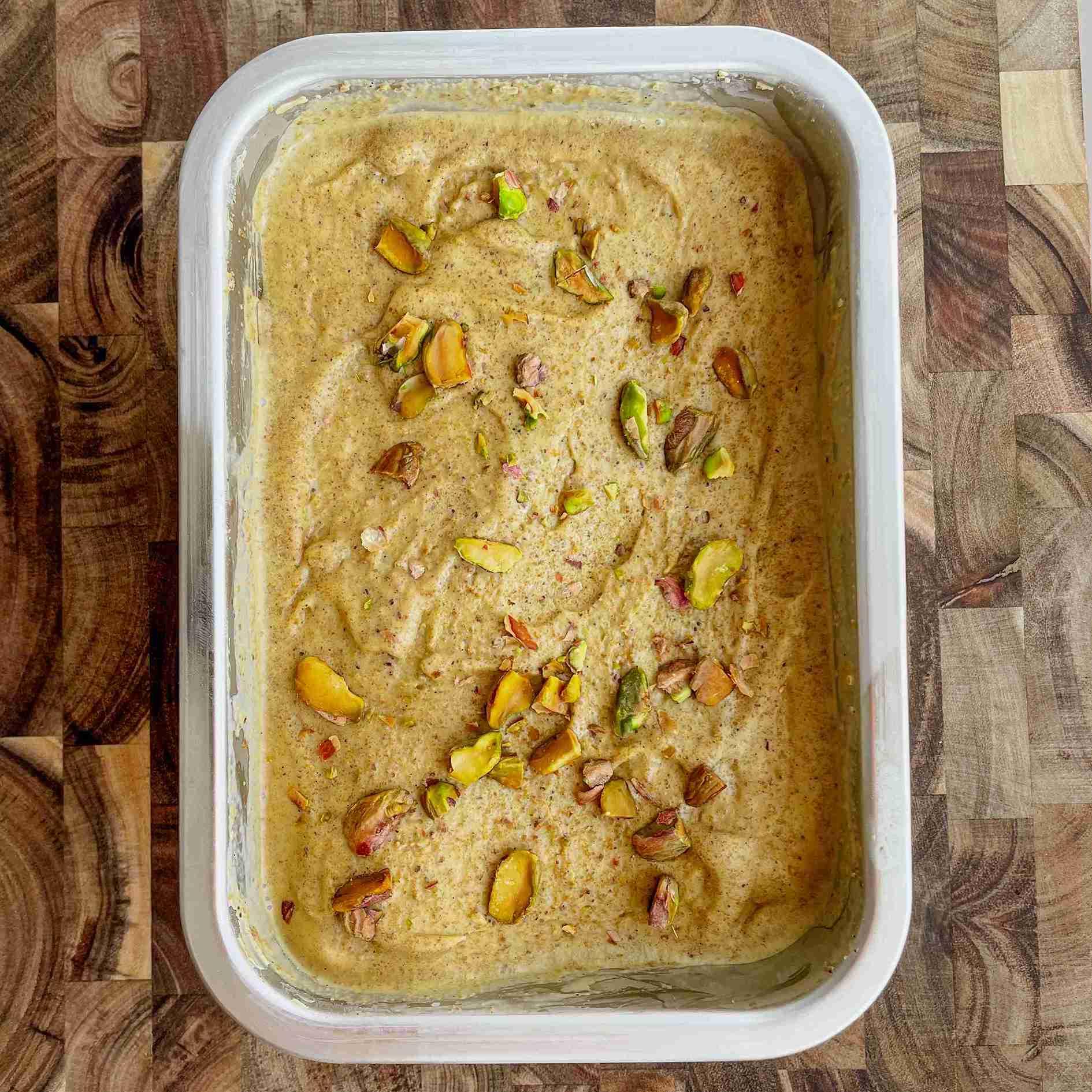 creamy homemade pistachio ice cream topped with chopped pistachios