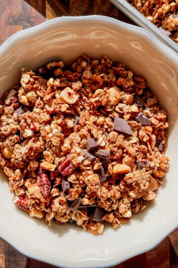 Crunchy sourdough discard granola clusters with brown butter and dark chocolate chunks