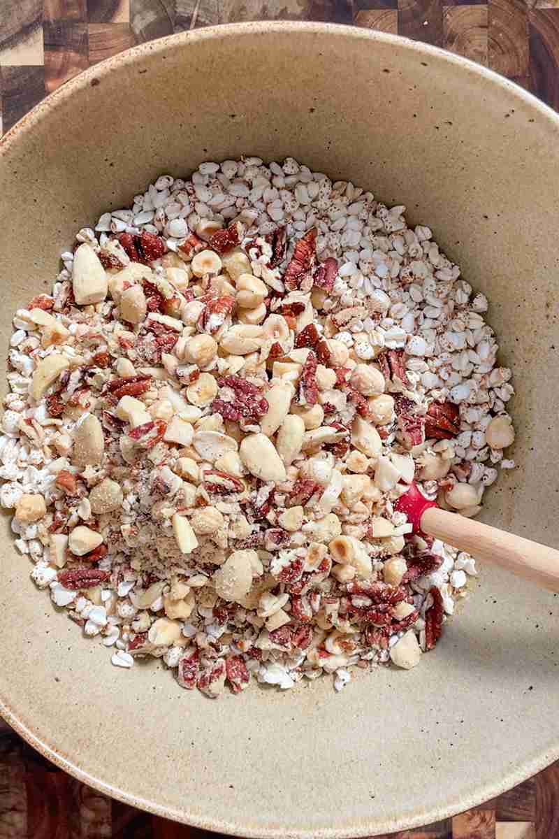 Oats, chopped nuts and puffed buckwheat mixed into sourdough granola