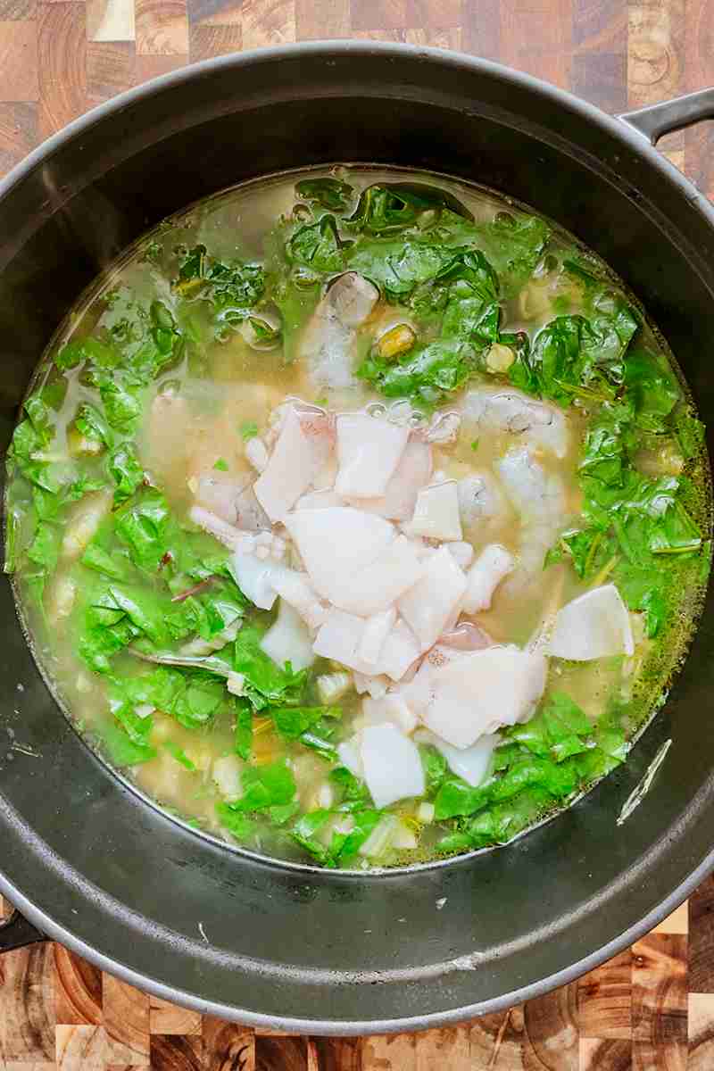Shrimp and calamari added to swiss chard fennel soup.